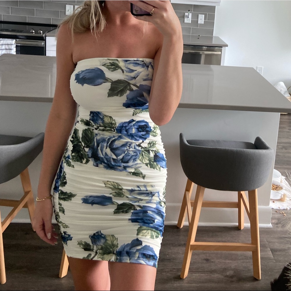 White mini dress with floral details